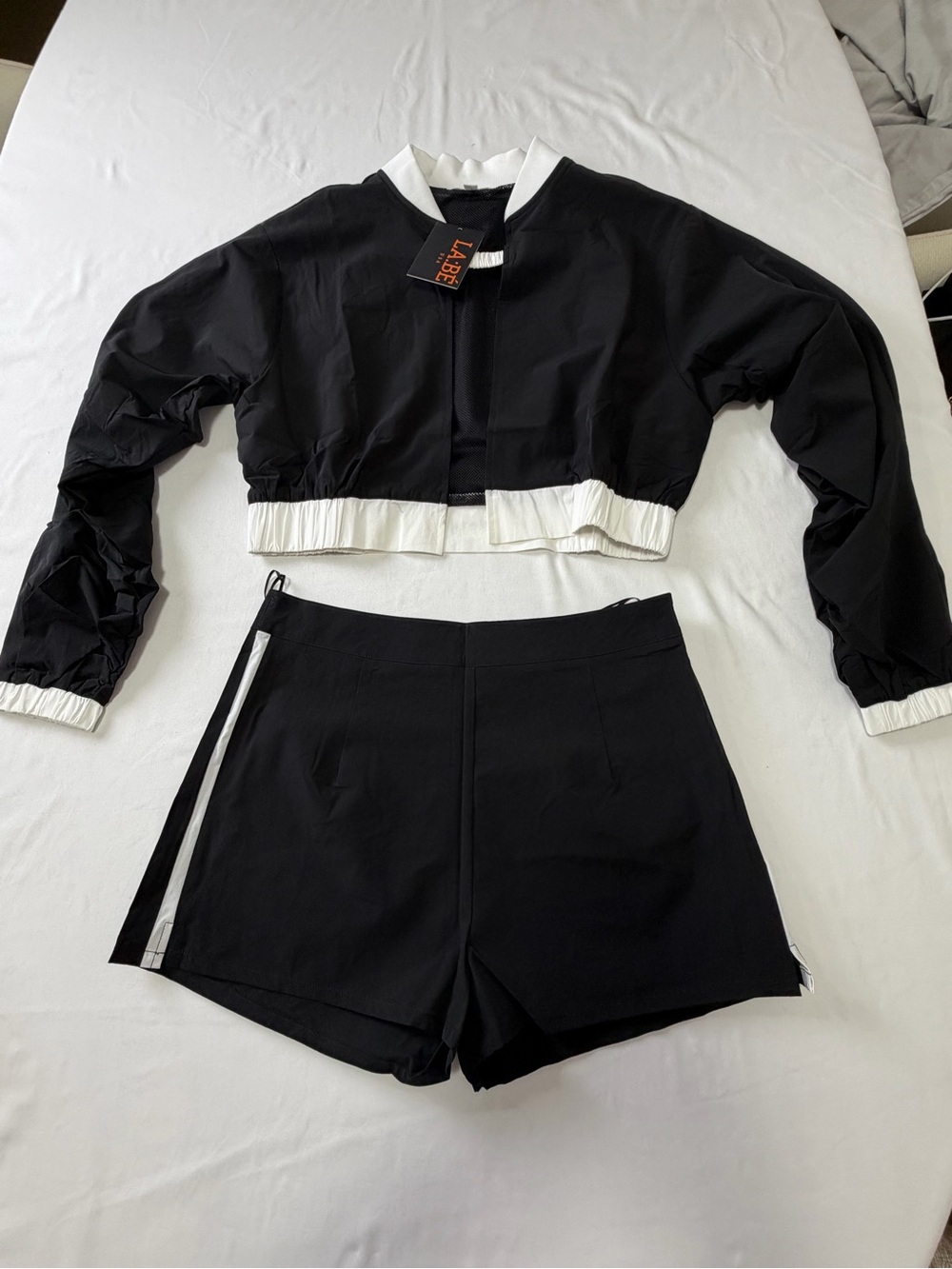 High-Waist Black Athletic Shorts with White Side Stripe and matching jacket